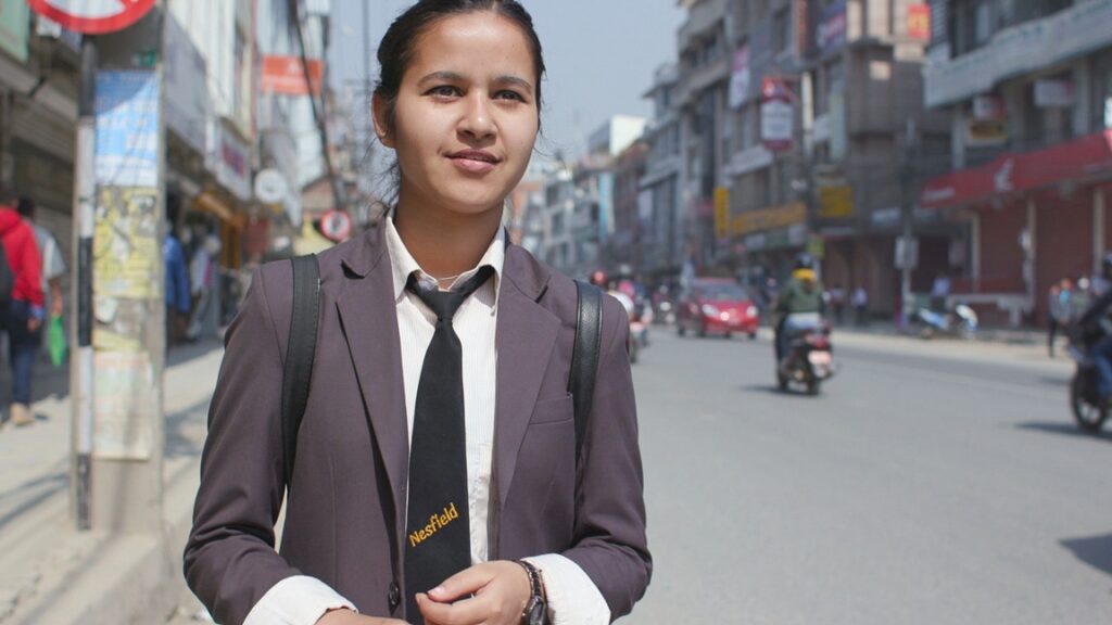 A student in her school uniform